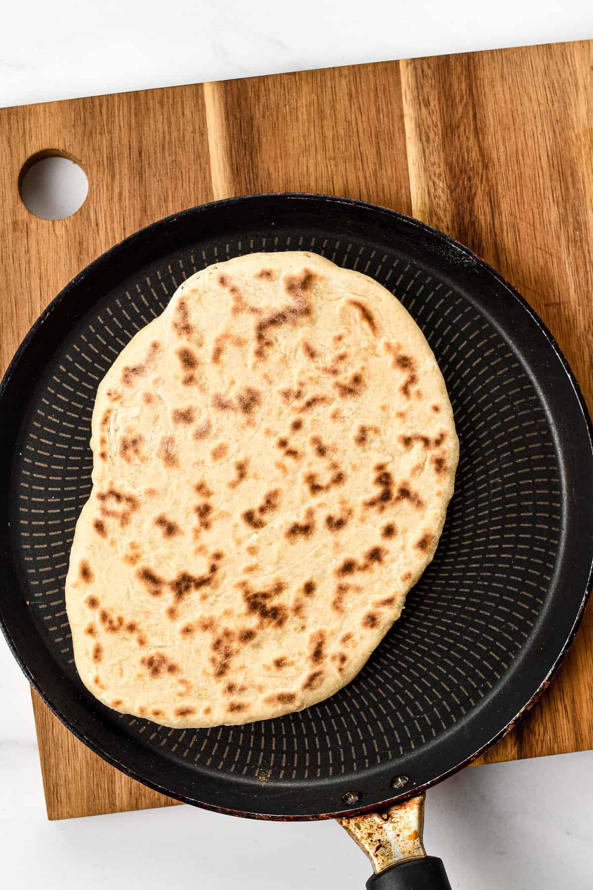 3-Ingredient Flatbread Cooking On Other Side