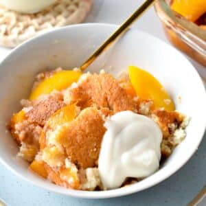 This Peach Cobbler with cake mix is the easiest dessert you will ever make. Plus, you don't need eggs or fancy ingredients to make this easy cobbler recipe, and barely 10 minutes to put together.