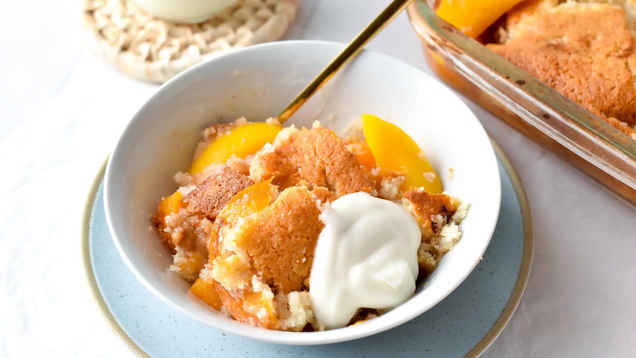 This Peach Cobbler with cake mix is the easiest dessert you will ever make. Plus, you don't need eggs or fancy ingredients to make this easy cobbler recipe, and barely 10 minutes to put together.