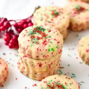 These Homemade Jingles Cookies are delicious buttery shortbread with a touch of anise extract and lovely red and green sugar sprinkles. They are the perfect holiday shortbread for Christmas.