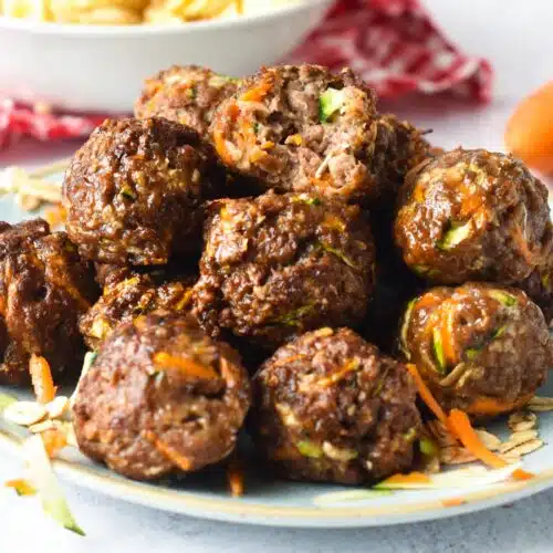 These Meatballs for dogs are easy healthy meatballs for your furry pet. They are packed with vegetables, lean ground meat, and fiber from oats.