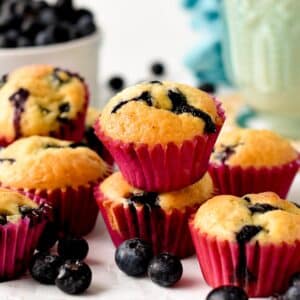 These mini blueberry muffins are tasty small-serve blueberry muffins filled with juicy blueberries and fluffy vanilla crumbs. They are perfect for kids' lunchboxes or small hands.