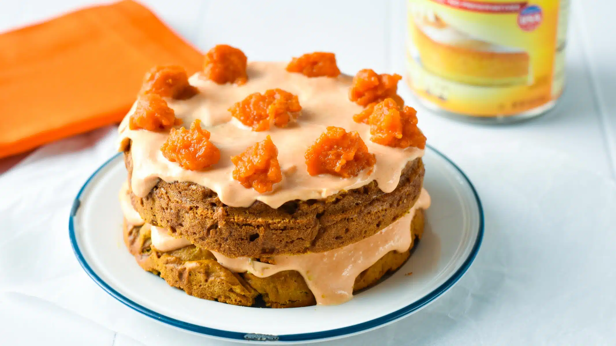 This Pumpkin Dog Cake Recipe is an easy one bowl cake for dogs to celebrate fall. It's packed with homemade pumpkin puree, peanut butter and oats for an healthy treat for your furry friend.