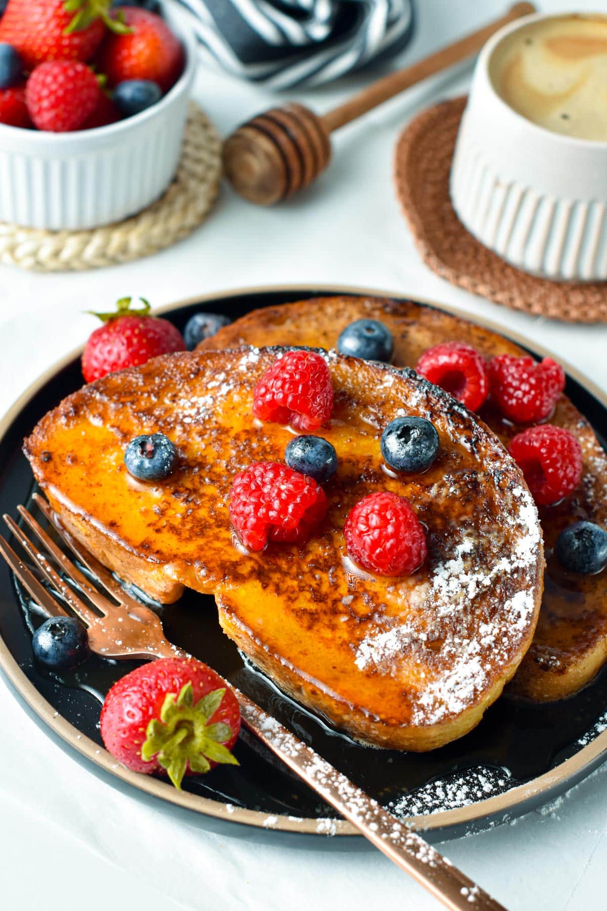 These Sourdough French Toast are the most delicious family breakfast recipe with thick slices of sourdough bread custardy on the inside and crispy on the edges.