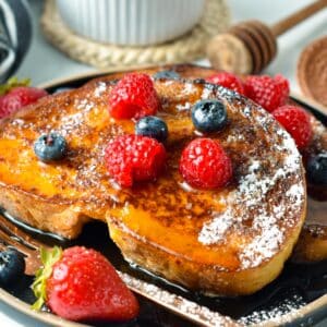 These Sourdough French Toast are the most delicious family breakfast recipe with thick slices of sourdough bread custardy on the inside and crispy on the edges.